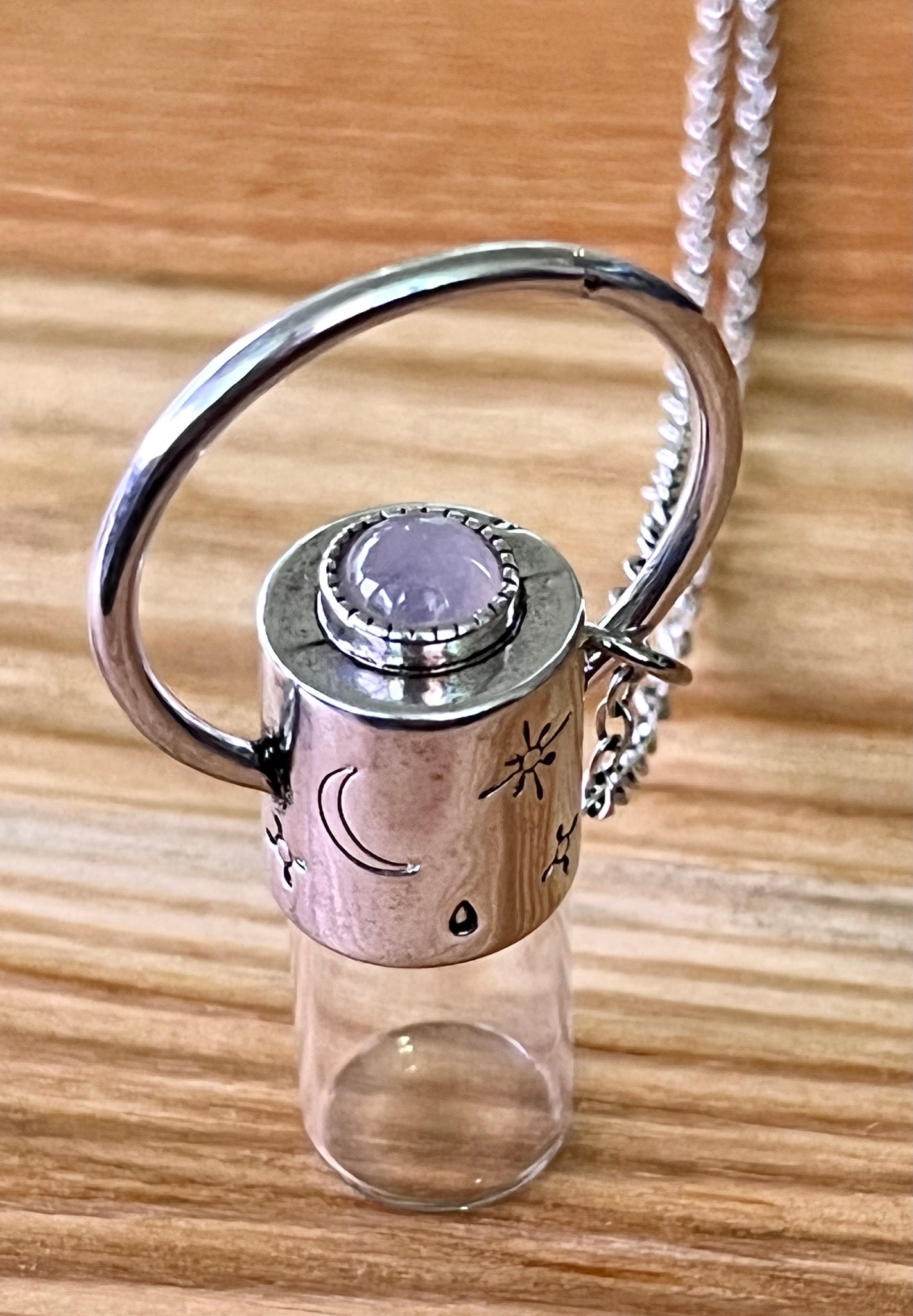 Roller hot sale bottle necklace